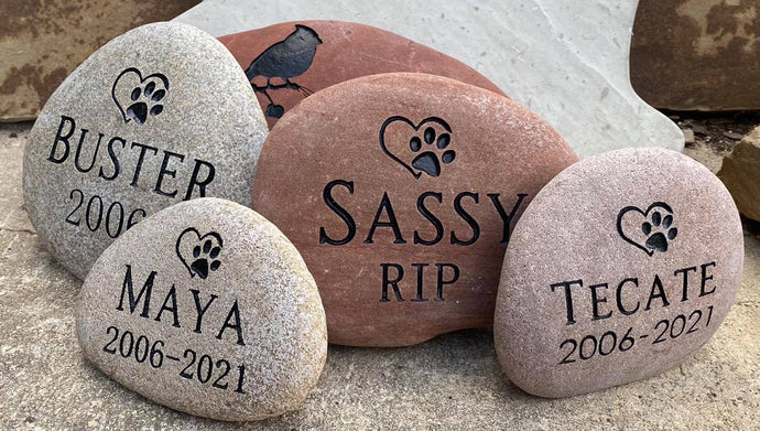 River stone pet memorial stones engraved with names and dates